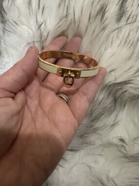 Coach Gold Tone White Metal Bangle Bracelet with Turnlock Clasp
